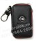 Ключница Ниссан черная с красной строчкой на застежке на молнии - фото 23532